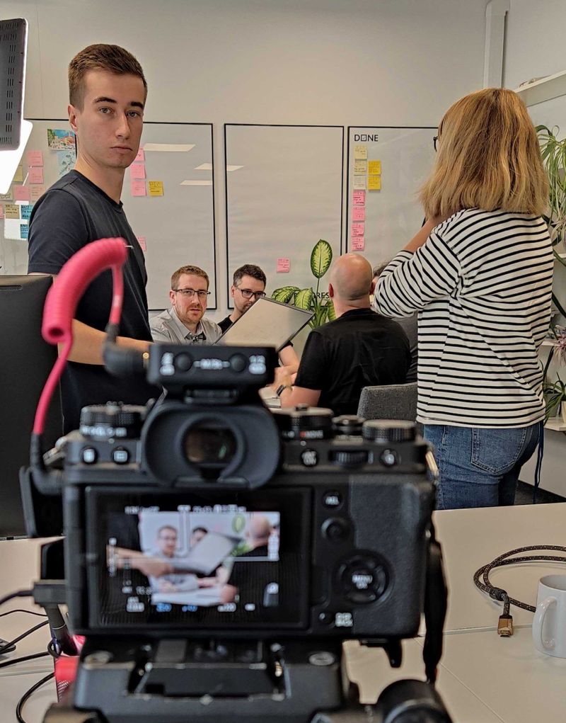 Poz Tech Talks set, cameras and people are visible